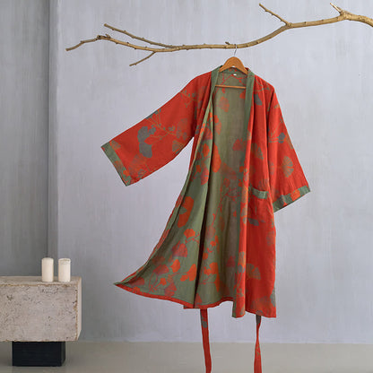 Kimono-badekåpe i fargekombinasjonen oransje og grønn