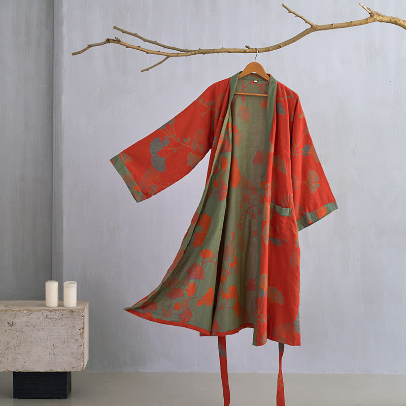 Kimono-badekåpe i fargekombinasjonen oransje og grønn