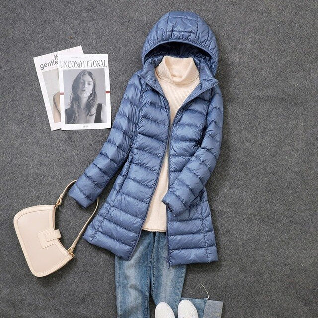 Lang dunjakke til dame sett bakfra