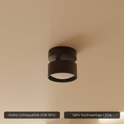 Nærbilde av sylinderformet svart taklampe med LED-belysning