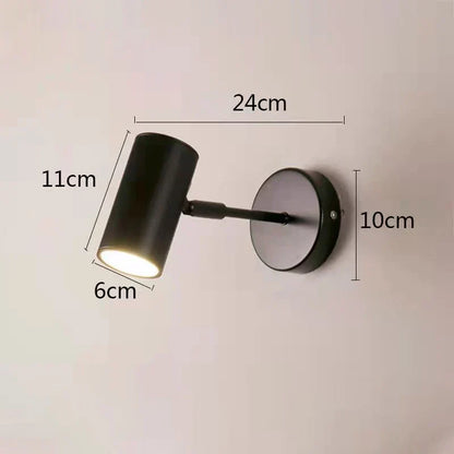 Justerbar vegglampe med hodet rettet nedover